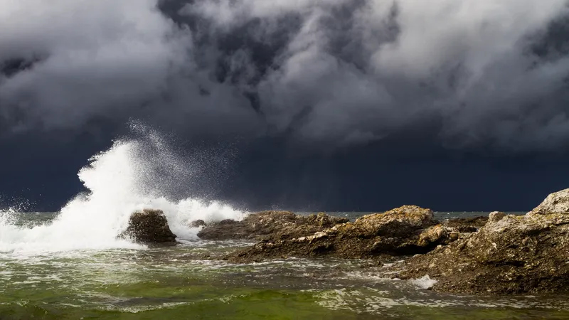 Storm wave over rocks